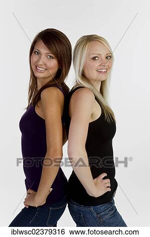 Stock Photograph - Two smiling young women. Fotosearch