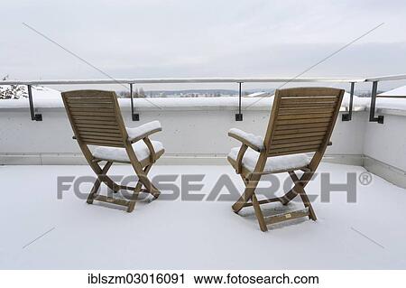 "Two snow-covered chairs on a terrace, Kreuzlingen, Canton of Thurgau, Switzerland, Europe" View Large Photo Image Stock Image - "Two snow-covered chairs on a terrace, Kreuzlingen, Canton of Thurgau, Switzerland, Europe". Fotosearch