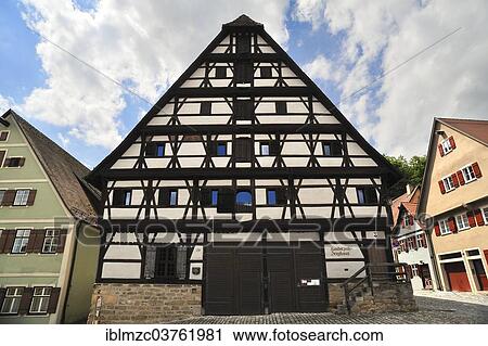 "Two-storey half-timbered building on a stone plinth with a steep hipped roof, cantilevered upper floor, ca. 1500, former municipal granary, Dinkelsbuhl, Middle Franconia, Bavaria, Germany, Europe" View Large Photo Image Stock Image - "Two-storey half-timbered building on a stone plinth with a steep hipped roof, cantilevered upper floor, ca. 1500, former municipal granary, Dinkelsbuhl, Middle Franconia, Bavaria, Germany, Europe". Fotosearch