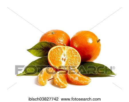 Two whole and a half Mandarine and Mandarine pieces View Large Photo Image Stock Image - Two whole and a half Mandarine and Mandarine pieces. Fotosearch