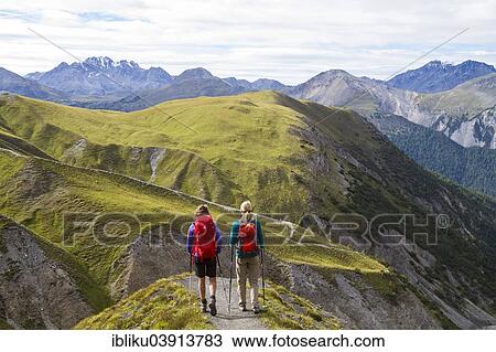 "Two women hiking, Val dal Botsch, Swiss National Park, Graubunden, Switzerland, Europe" View Large Photo Image Stock Image - "Two women hiking, Val dal Botsch, Swiss National Park, Graubunden, Switzerland, Europe". Fotosearch