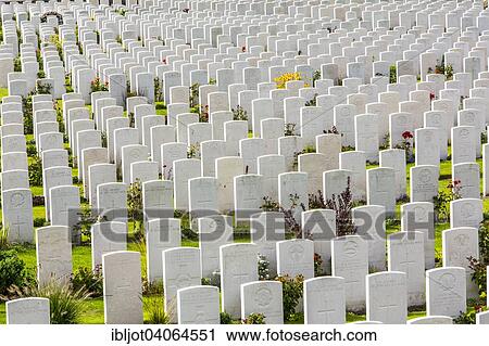 "Tyne Cot Commonwealth War Graves Cemetery, the largest Commonwealth cemetery in the world, with over 12, 000 soldiers' graves from the First World War, Passendale, West Flanders, Belgium, Europe" View Large Photo Image Stock Image - "Tyne Cot Commonwealth War Graves Cemetery, the largest Commonwealth cemetery in the world, with over 12, 000 soldiers' graves from the First World War, Passendale, West Flanders, Belgium, Europe". Fotosearch