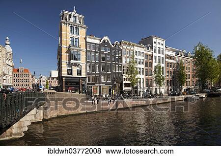 "Typical buildings on the banks of the canal, Amsterdam, North Holland province, Netherlands" View Large Photo Image Stock Photo - "Typical buildings on the banks of the canal, Amsterdam, North Holland province, Netherlands". Fotosearch