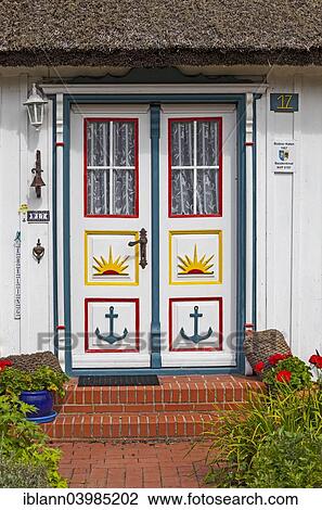 "Typical carved and painted door of a wood house, Wieck, Fischland-Zingst, Mecklenburg-Western Pomerania, Germany, Europe" View Large Photo Image Stock Image - "Typical carved and painted door of a wood house, Wieck, Fischland-Zingst, Mecklenburg-Western Pomerania, Germany, Europe". Fotosearch
