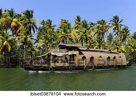 Picture - "Typical converted rice boat, kettuvallam, for tourist trips in the backwaters of Kerala, South India, India, Asia". Fotosearch