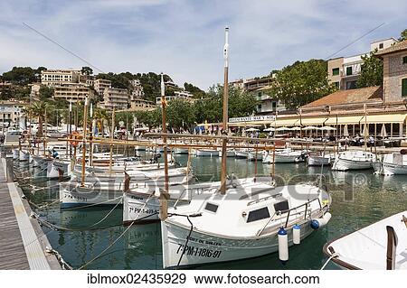 "Typical fishing boats in the harbor of Port de Soller, Soller, northwest coast of Mallorca, Balearic Islands, Mediterranean Sea, Spain, Europe" View Large Photo Image Stock Photo - "Typical fishing boats in the harbor of Port de Soller, Soller, northwest coast of Mallorca, Balearic Islands, Mediterranean Sea, Spain, Europe". Fotosearch