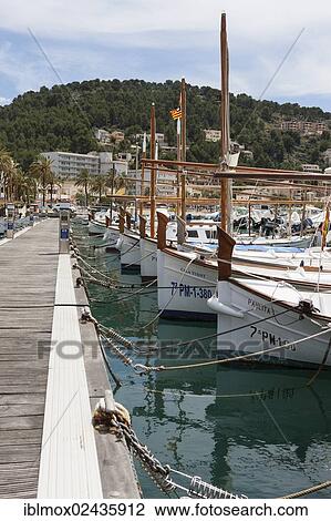 "Typical fishing boats in the harbour of Port de Soller, Soller, northwest coast of Mallorca, Balearic Islands, Mediterranean Sea, Spain, Europe" View Large Photo Image Stock Image - "Typical fishing boats in the harbour of Port de Soller, Soller, northwest coast of Mallorca, Balearic Islands, Mediterranean Sea, Spain, Europe". Fotosearch