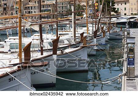"Typical fishing boats in the harbour of Port de Soller, Soller, northwest coast of Mallorca, Balearic Islands, Mediterranean Sea, Spain, Europe" View Large Photo Image Stock Image - "Typical fishing boats in the harbour of Port de Soller, Soller, northwest coast of Mallorca, Balearic Islands, Mediterranean Sea, Spain, Europe". Fotosearch