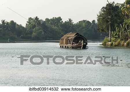 "Typical houseboat on a canal, Kerala backwaters at dusk, Alappuzha, Kerala, India, Asia" View Large Photo Image Stock Image - "Typical houseboat on a canal, Kerala backwaters at dusk, Alappuzha, Kerala, India, Asia". Fotosearch