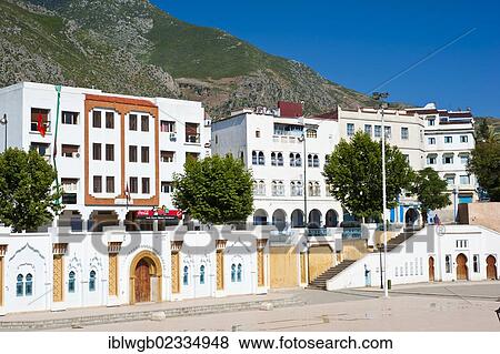 Stock Photo - "Typical houses in front of a hill, Chefchaouen, Rif or Riff Mountains, northern Morocco, Morocco, Africa". Fotosearch