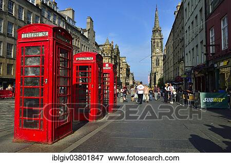 Stock Photo - "Typical red telephone boxes in the High Street, Edinburgh, Scotland, United Kingdom, Europe". Fotosearch