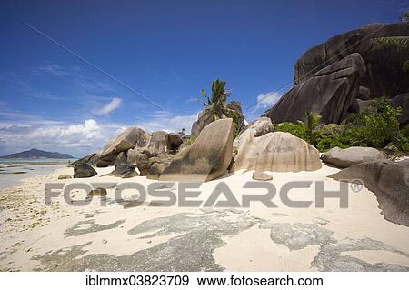 Stock Photo - "Typical rock formations in the Seychelles at a sandy beach, Anse Union, La Digue, Seychelles, Africa". Fotosearch