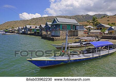 "Typical stilt houses at the harbour of the village of Komodo, Komodo National Park, UNESCO World Heritage Site, Komodo Island, Indonesia, Asia" View Large Photo Image Stock Image - "Typical stilt houses at the harbour of the village of Komodo, Komodo National Park, UNESCO World Heritage Site, Komodo Island, Indonesia, Asia". Fotosearch