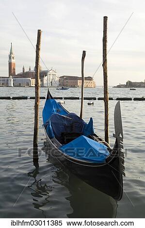 Stock Photography - "Typical Venetian gondola on the Grand Canal, Canal Grande, San Giorgio Maggiore at back, Canale Grande, Venice, Venezien, Italy, Europe". Fotosearch