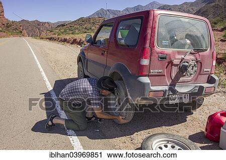 "Tyre change on an SUVs, La Rioja, Argentina, South America" View Large Photo Image Stock Image - "Tyre change on an SUVs, La Rioja, Argentina, South America". Fotosearch