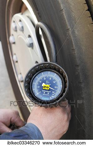 "Tyre pressure measurement on a truck, Germany, Europe" View Large Photo Image Stock Image - "Tyre pressure measurement on a truck, Germany, Europe". Fotosearch