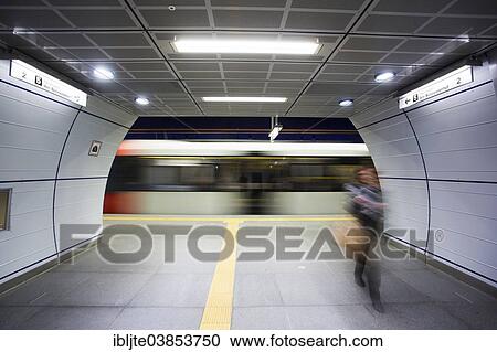 Stock Image - "U-Bahn underground train leaving the station, U-Bahnstation Rathaus underground railway station, Cologne, North Rhine-Westphalia, Germany, Europe". Fotosearch