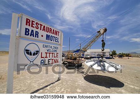 "UFO hanging on the tow hook in the car park of the """"Little A'Le'Inn"""" pub, Rachel, Rachel, Nevada, United States, North America" View Large Photo Image Stock Photo - "UFO hanging on the tow hook in the car park of the """"Little A'Le'Inn"""" pub, Rachel, Rachel, Nevada, United States, North America". Fotosearch