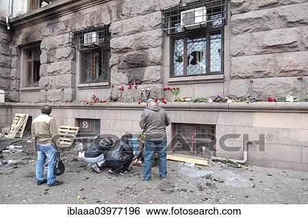 "Ukraine conflict, people gathered in front of the burnt down building of the trades union to honor the memory of 42 killed supporters of the federalization of Ukraine, Odessa, Odessa Oblast, Ukraine, Europe" View Large Photo Image Stock Photograph - "Ukraine conflict, people gathered in front of the burnt down building of the trades union to honor the memory of 42 killed supporters of the federalization of Ukraine, Odessa, Odessa Oblast, Ukraine, Europe". Fotosearch