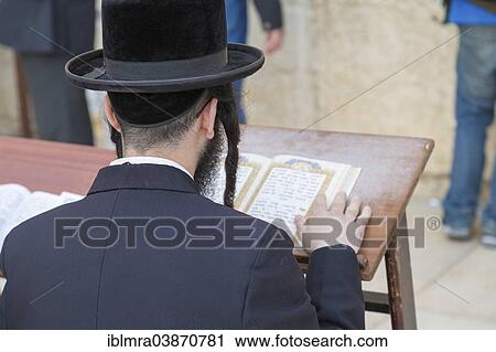 "Ultra-orthodox Jew praying at the Western Wall, Wailing Wall, view over his shoulder onto the Talmud, Jerusalem, Israel, Asia" View Large Photo Image Stock Image - "Ultra-orthodox Jew praying at the Western Wall, Wailing Wall, view over his shoulder onto the Talmud, Jerusalem, Israel, Asia". Fotosearch