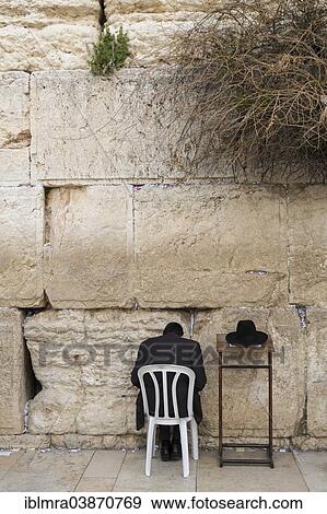"Ultra-orthodox Jew praying at the Western Wall, Wailing Wall, rear view, Jerusalem, Israel, Asia" View Large Photo Image Stock Photo - "Ultra-orthodox Jew praying at the Western Wall, Wailing Wall, rear view, Jerusalem, Israel, Asia". Fotosearch