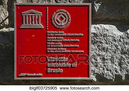 "UNESCO plaque on the circular viaduct of Brusio, Rhaetian Railway, Brusio, Canton of Graubunden, Switzerland, Europe" View Large Photo Image Stock Photography - "UNESCO plaque on the circular viaduct of Brusio, Rhaetian Railway, Brusio, Canton of Graubunden, Switzerland, Europe". Fotosearch