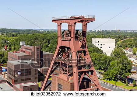 "UNESCO World Heritage Site Zeche Zollverein, Red Dot Design Museum, Doppelbock headframe, shaft 12, Zollverein-Kubus building, Essen, North Rhine-Westphalia, Germany, Europe" View Large Photo Image Stock Image - "UNESCO World Heritage Site Zeche Zollverein, Red Dot Design Museum, Doppelbock headframe, shaft 12, Zollverein-Kubus building, Essen, North Rhine-Westphalia, Germany, Europe". Fotosearch