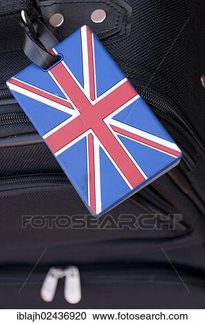 Union Jack luggage tag on a black flight bag View Large Photo Image Stock Image - Union Jack luggage tag on a black flight bag. Fotosearch