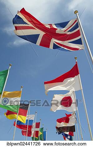 Stock Photograph - Union Jack or Union Flag and various other international flags flying. Fotosearch