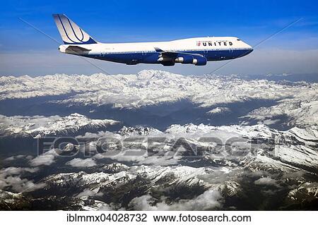 United Airlines Boeing 747-422 N104UA in flight over the Alps View Large Photo Image Stock Image - United Airlines Boeing 747-422 N104UA in flight over the Alps. Fotosearch