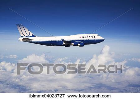 Stock Photo - United Airlines Boeing 747-422 N104UA in flight. Fotosearch