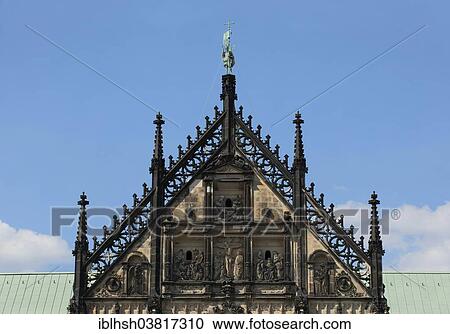 Stock Image - "Upper southern front of the eastern transept with scenes from the life of Christ, Gothic, Munster Cathedral, Munster, North Rhine-Westphalia, Germany, Europe". Fotosearch