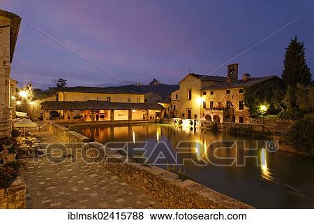Val d'Orcia, Orcia Valley, Bagno Vignoni, early morning mood at the old pool of the thermal spring, San Qurico d'Orcia, Tuscany region, province of Siena, Italy, Europe View Large Photo Image Stock Photo - Val d'Orcia, Orcia Valley, Bagno Vignoni, early morning mood at the old pool of the thermal spring, San Qurico d'Orcia, Tuscany region, province of Siena, Italy, Europe. Fotosearch