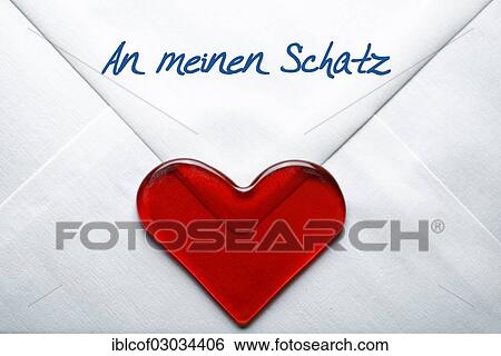 Stock Photograph - "Valentine's letter with a heart and the message """"An meinen Schatz"""", German for """"To My Sweetheart""""". Fotosearch