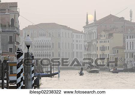 "Vaporetto and gondolas on the Grand Canal, Palazzo Ca' Foscari, Palazzo Balbi, San Toma Vaporetto stop, Venice, Venezia, Veneto, Italy, Europe" View Large Photo Image Stock Image - "Vaporetto and gondolas on the Grand Canal, Palazzo Ca' Foscari, Palazzo Balbi, San Toma Vaporetto stop, Venice, Venezia, Veneto, Italy, Europe". Fotosearch