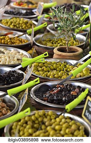 "Various types of olives at a market stall, L'Ile-Rousse, Balagne, Corsica, France, Europe" View Large Photo Image Stock Photo - "Various types of olives at a market stall, L'Ile-Rousse, Balagne, Corsica, France, Europe". Fotosearch