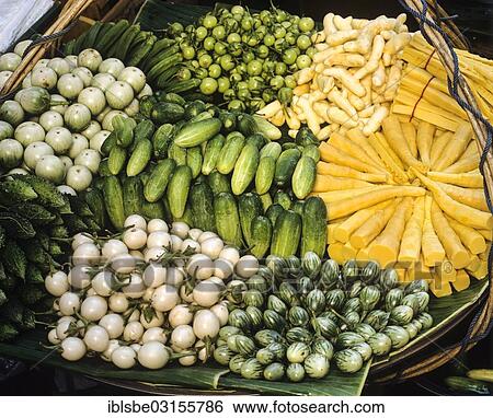 Stock Photograph - "Various types of vegetables in the market, cucumbers, ginger, Thai cuisine, Bangkok, Central Thailand, Thailand, Asia". Fotosearch