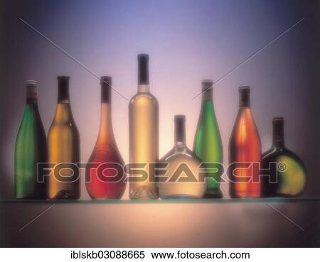 Various wine bottles next to each other View Large Photo Image Stock Photography - Various wine bottles next to each other. Fotosearch