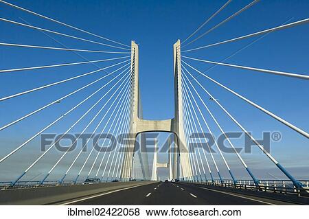 Vasco da Gama Bridge, Ponte Vasco da Gama over river Tagus near Lisboa, Lisbon, Portugal, Europe View Large Photo Image Stock Photo - Vasco da Gama Bridge, Ponte Vasco da Gama over river Tagus near Lisboa, Lisbon, Portugal, Europe. Fotosearch