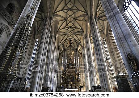 "Vaulted ceiling and chancel of the late-gothic three-naved hall church, St. George's Minster, 1499, Dinkelsbuhl, Middle Franconia, Bavaria, Germany, Europe" View Large Photo Image Stock Photo - "Vaulted ceiling and chancel of the late-gothic three-naved hall church, St. George's Minster, 1499, Dinkelsbuhl, Middle Franconia, Bavaria, Germany, Europe". Fotosearch