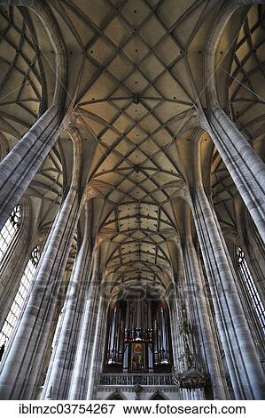 "Vaulted ceiling and organ on the gallery of the late-gothic three-naved hall church, St. George's Minster, 1499, Dinkelsbuhl, Middle Franconia, Bavaria, Germany, Europe" View Large Photo Image Stock Photo - "Vaulted ceiling and organ on the gallery of the late-gothic three-naved hall church, St. George's Minster, 1499, Dinkelsbuhl, Middle Franconia, Bavaria, Germany, Europe". Fotosearch