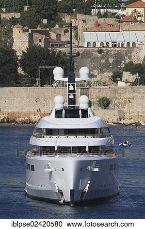 Stock Image - Vava II, a cruiser built by Pendennis Plus, formerly Devenport Yachts, length: 96 m, built in 2012, owned by Ernesto Bertarelli, anchored in the Bay of Villefranche, French Riviera, France, Mediterranean Sea, Europe. Fotosearch