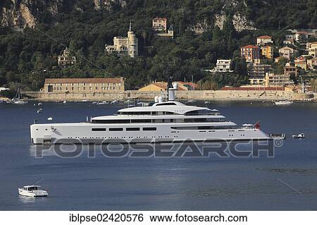 Vava II, a cruiser built by Pendennis Plus, formerly Devenport Yachts, length: 96 m, built in 2012, owned by Ernesto Bertarelli, anchored in the bay of Villefranche, French Riviera, France, Mediterranean Sea, Europe View Large Photo Image Stock Photograph - Vava II, a cruiser built by Pendennis Plus, formerly Devenport Yachts, length: 96 m, built in 2012, owned by Ernesto Bertarelli, anchored in the bay of Villefranche, French Riviera, France, Mediterranean Sea, Europe. Fotosearch