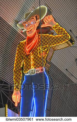 "Vegas Vic, famous cowboy figure and landmark, neon sign in old Las Vegas, Pioneer Casino Hotel, Fremont Street Experience, downtown, Las Vegas, Nevada, United States, North America" View Large Photo Image Stock Image - "Vegas Vic, famous cowboy figure and landmark, neon sign in old Las Vegas, Pioneer Casino Hotel, Fremont Street Experience, downtown, Las Vegas, Nevada, United States, North America". Fotosearch