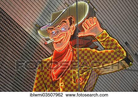 "Vegas Vic, famous cowboy figure and landmark, neon sign in old Las Vegas, Pioneer Casino Hotel, Fremont Street Experience, downtown, Las Vegas, Nevada, United States, North America" View Large Photo Image Stock Image - "Vegas Vic, famous cowboy figure and landmark, neon sign in old Las Vegas, Pioneer Casino Hotel, Fremont Street Experience, downtown, Las Vegas, Nevada, United States, North America". Fotosearch