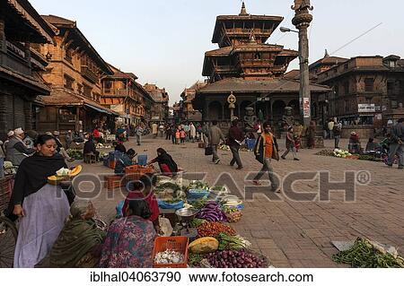 "Vegetable sales on the street, street scene, Dattatreya Temple at the back, Dattatreya Square, evening light, Bhaktapur, Nepal, Asia" View Large Photo Image Stock Image - "Vegetable sales on the street, street scene, Dattatreya Temple at the back, Dattatreya Square, evening light, Bhaktapur, Nepal, Asia". Fotosearch