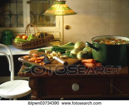Vegetables being prepared on a kitchen table View Large Photo Image Stock Image - Vegetables being prepared on a kitchen table. Fotosearch