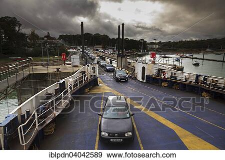 "Vehicles boarding ramp onto car ferry, Fishbourne, Isle of Wight, England, United Kingdom, Europe" View Large Photo Image Stock Photo - "Vehicles boarding ramp onto car ferry, Fishbourne, Isle of Wight, England, United Kingdom, Europe". Fotosearch