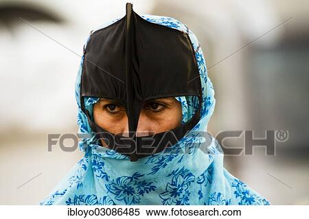 Stock Photography - "Veiled Omani woman, Nizwa, Ad Dakhiliyah region, Oman, Asia". Fotosearch