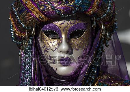 Stock Image - "Venetian Carnival mask and costume at the Venetian Fair on the historic market square, Ludwigsburg, Baden-Wurttemberg, Germany, Europe". Fotosearch